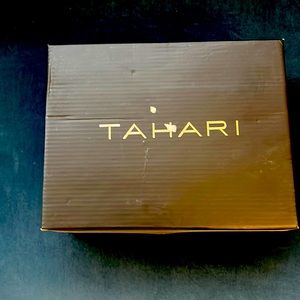 Rose Gold Metallic dress shoe with heel.